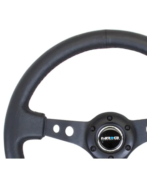 NRG Black Leather w/Black Spokes & Circle Cutouts Deep Dish Steering Wheel 350mm NRG Black Leather w/Black Spokes & Circle Cutouts Deep Dish Steering Wheel 350mm